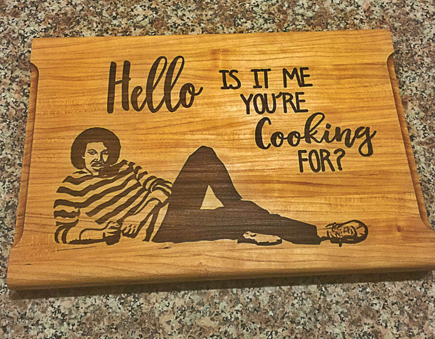 lionel richie cutting board - laying down